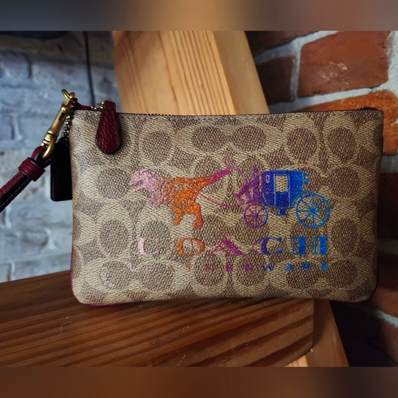 Coach Handbags - Coach Rexy Wristlet